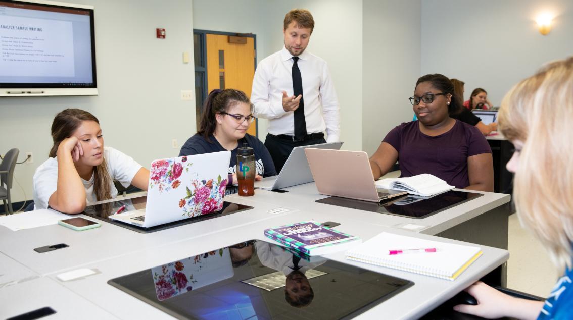 Students and professor in an English classroom