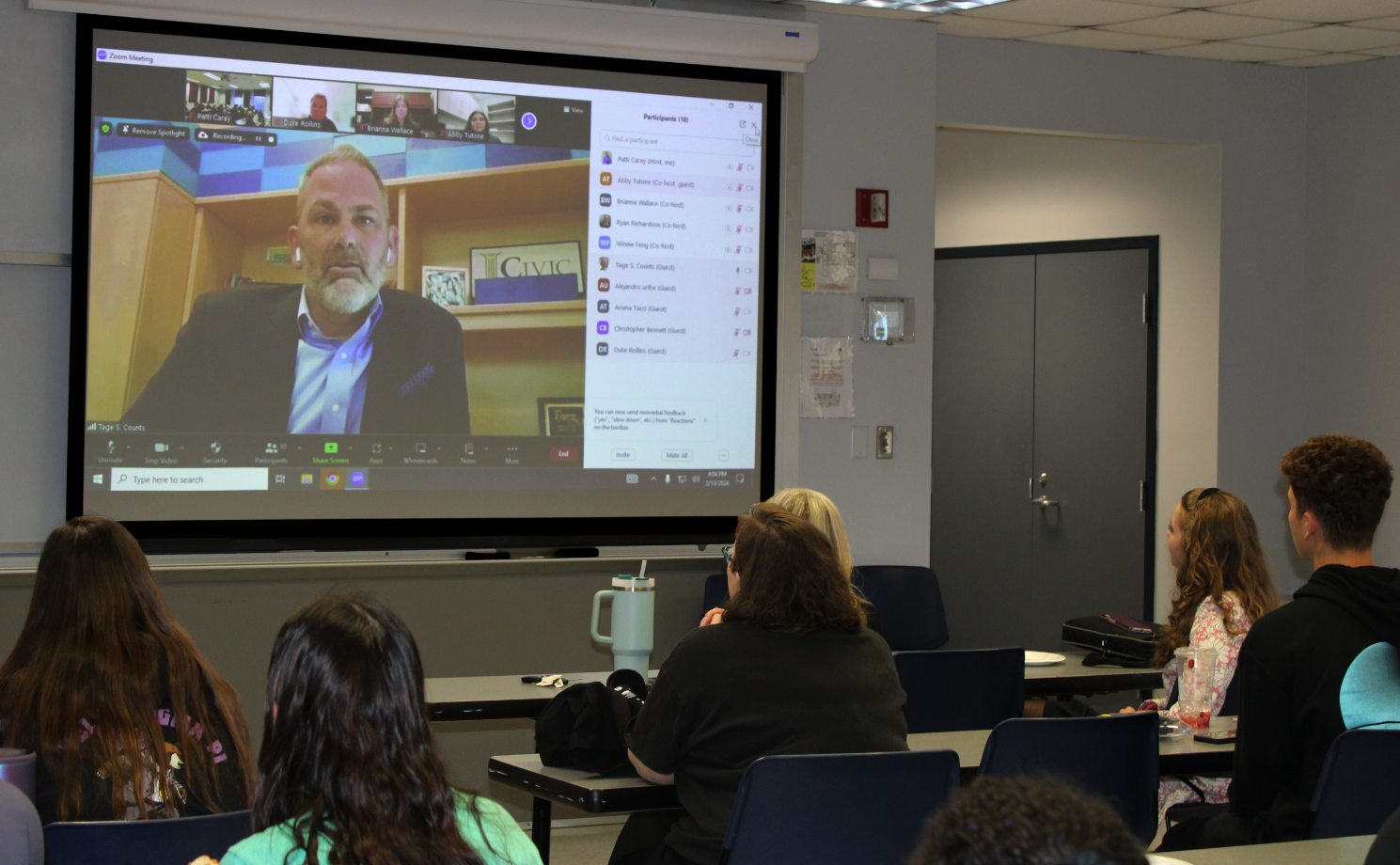 Speaker joins business students via Zoom.