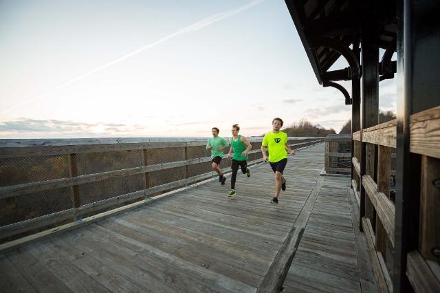 Longwood students running on High Bridge