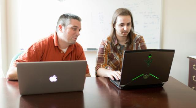 Dr. Julian Dymacek and Matthew Dyer ’18