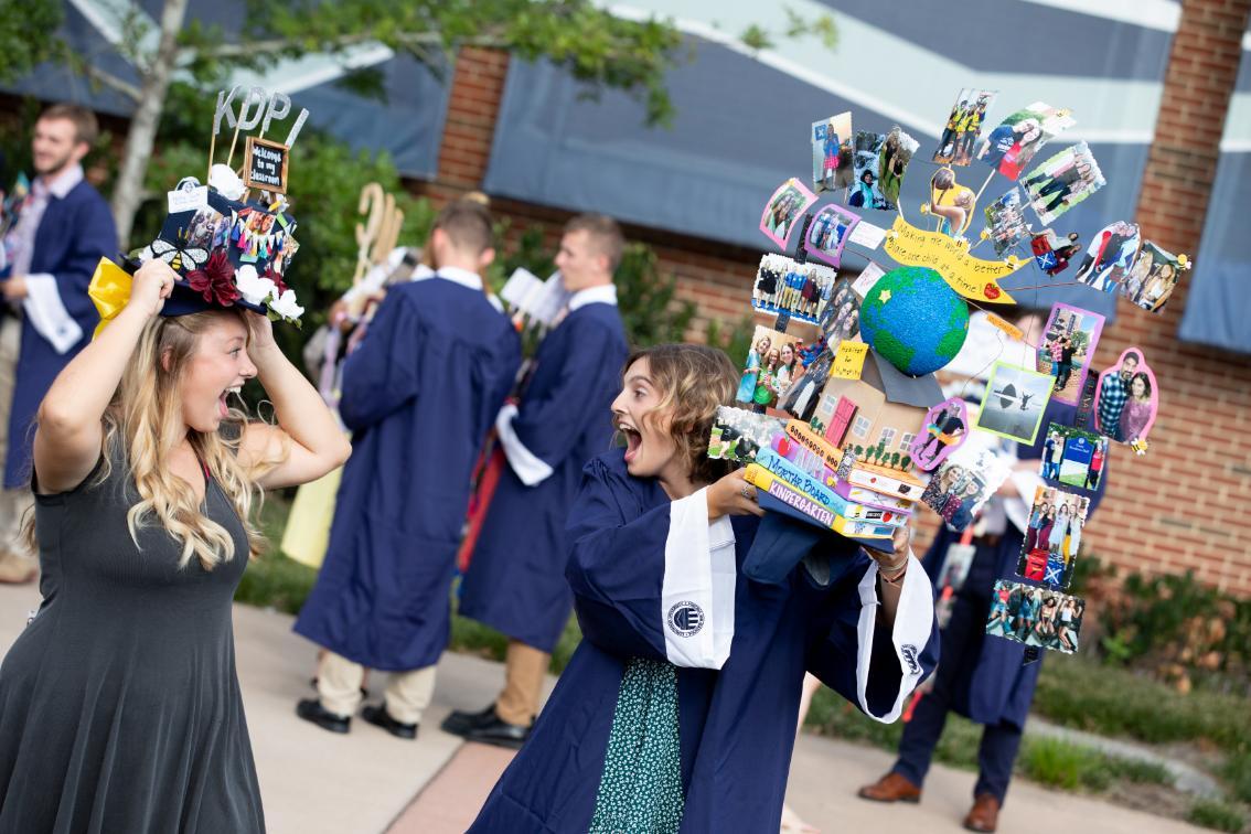 Capped seniors greet each other