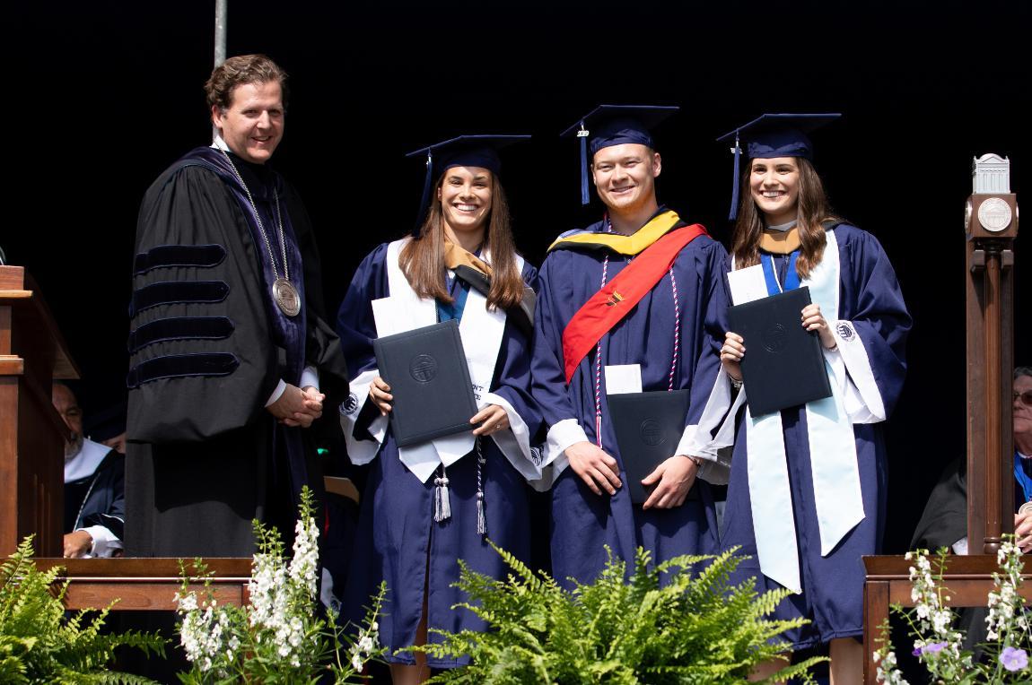 President Reveley with award winners Kate Spradlin '19, Zachary Morgan '19 and Kellen Spradlin '19